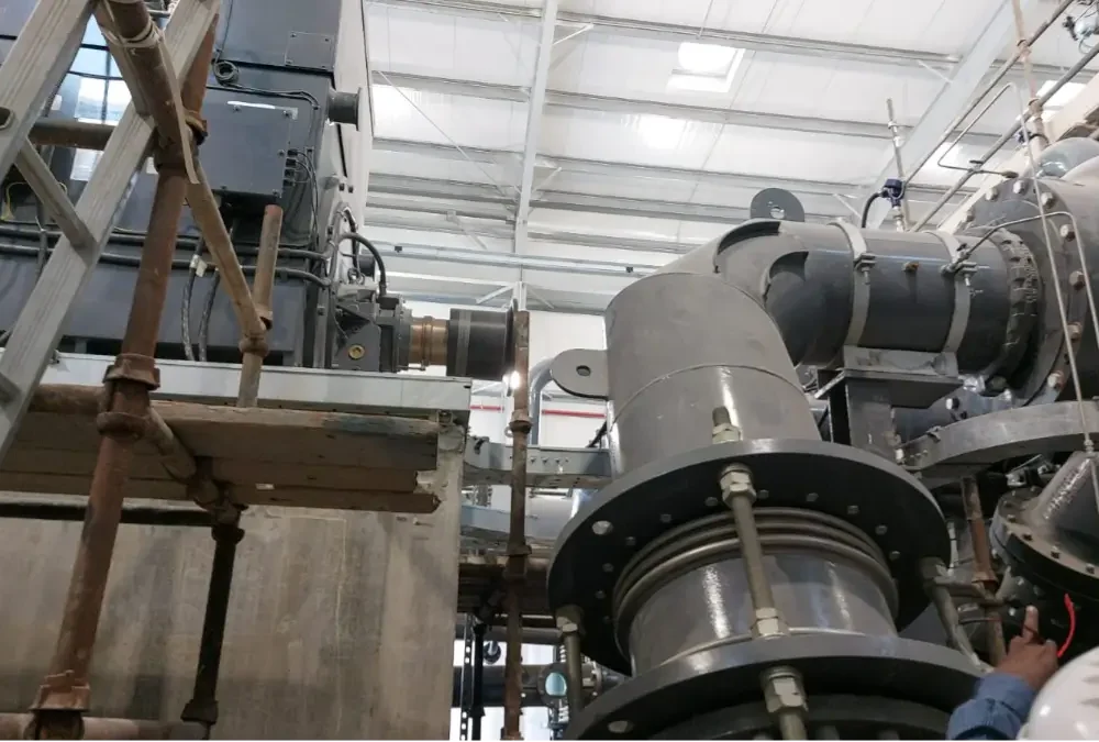 laser shaft alignment of 14-ton motor and compressor during new installation at abu dhabi gas plant