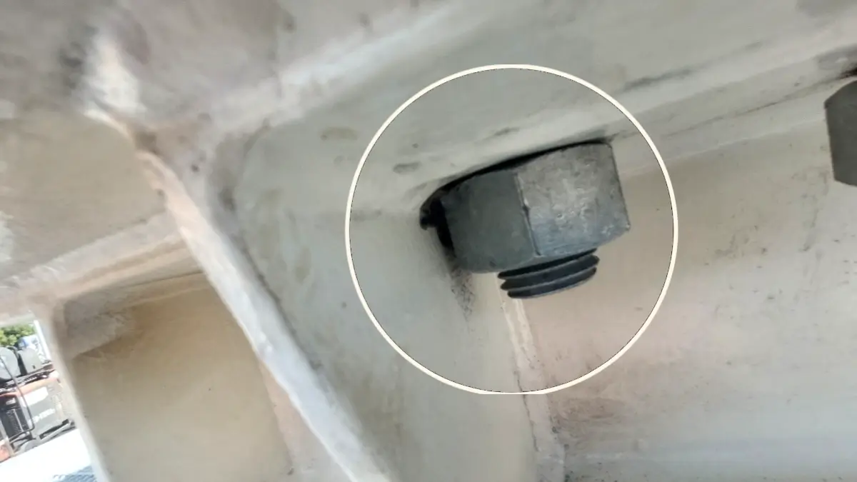 Motor base bolt and nut touching the base frame wall during laser alignment inspection
